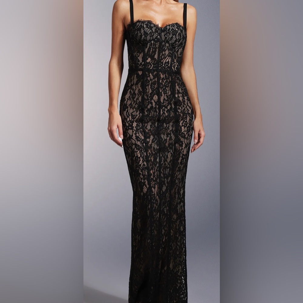 Elegant Black Lace Dress with a nude undertone.